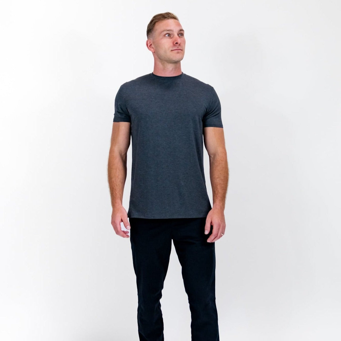 Charcoal grey Leo tee by Pillar Athletics, ultra-soft, lightweight, breathable fabric, tailored fit, and moisture-wicking for athleisure and everyday wear.
