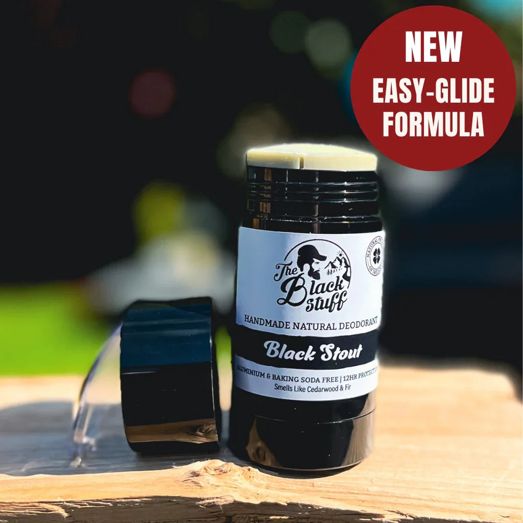 Black Stout Natural Deodorant with cedarwood and clove scent, easy-glide formula.