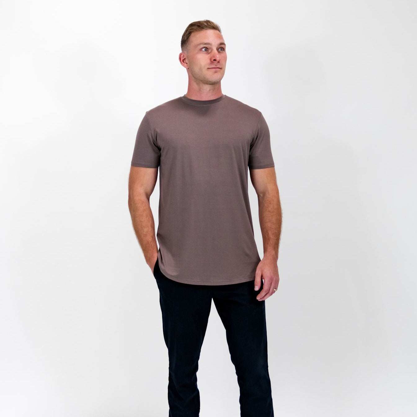 Mathew Clay Tee worn by model in neutral setting, showcasing its flattering tailored fit and soft, breathable fabric.