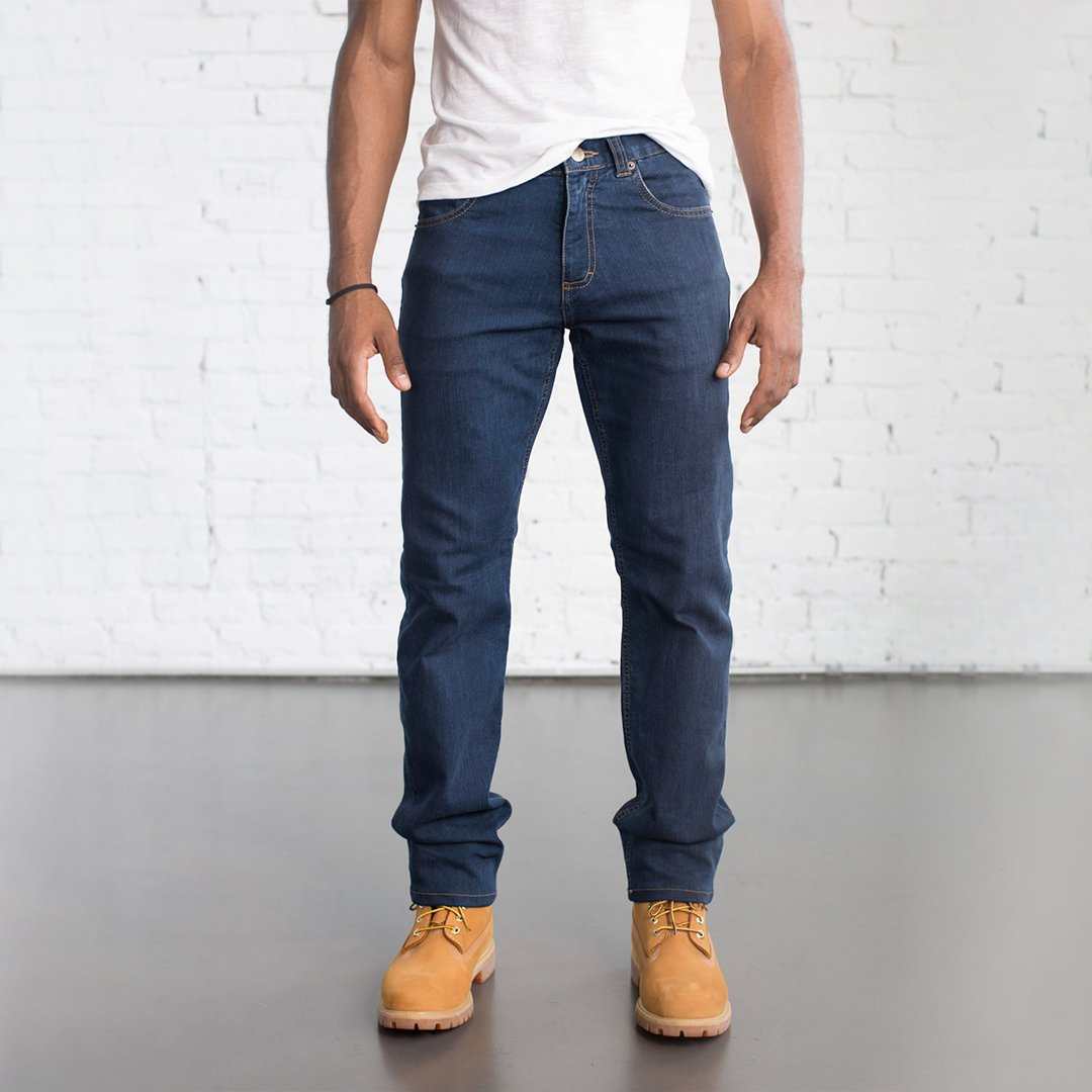 Dearborn Tailored Fit Denim in Medium Wash with a sleek fit through thighs, medium rise, and tapered below the knee.