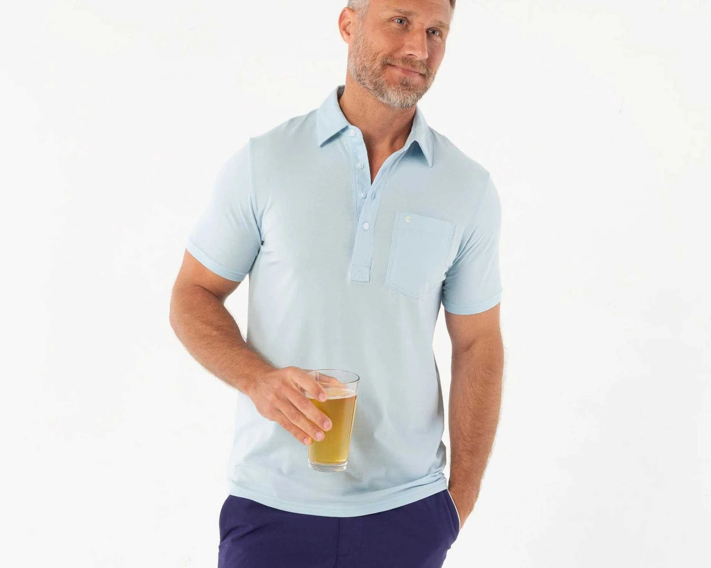 Top-Shelf Players Shirt in light blue worn by a man holding a drink.