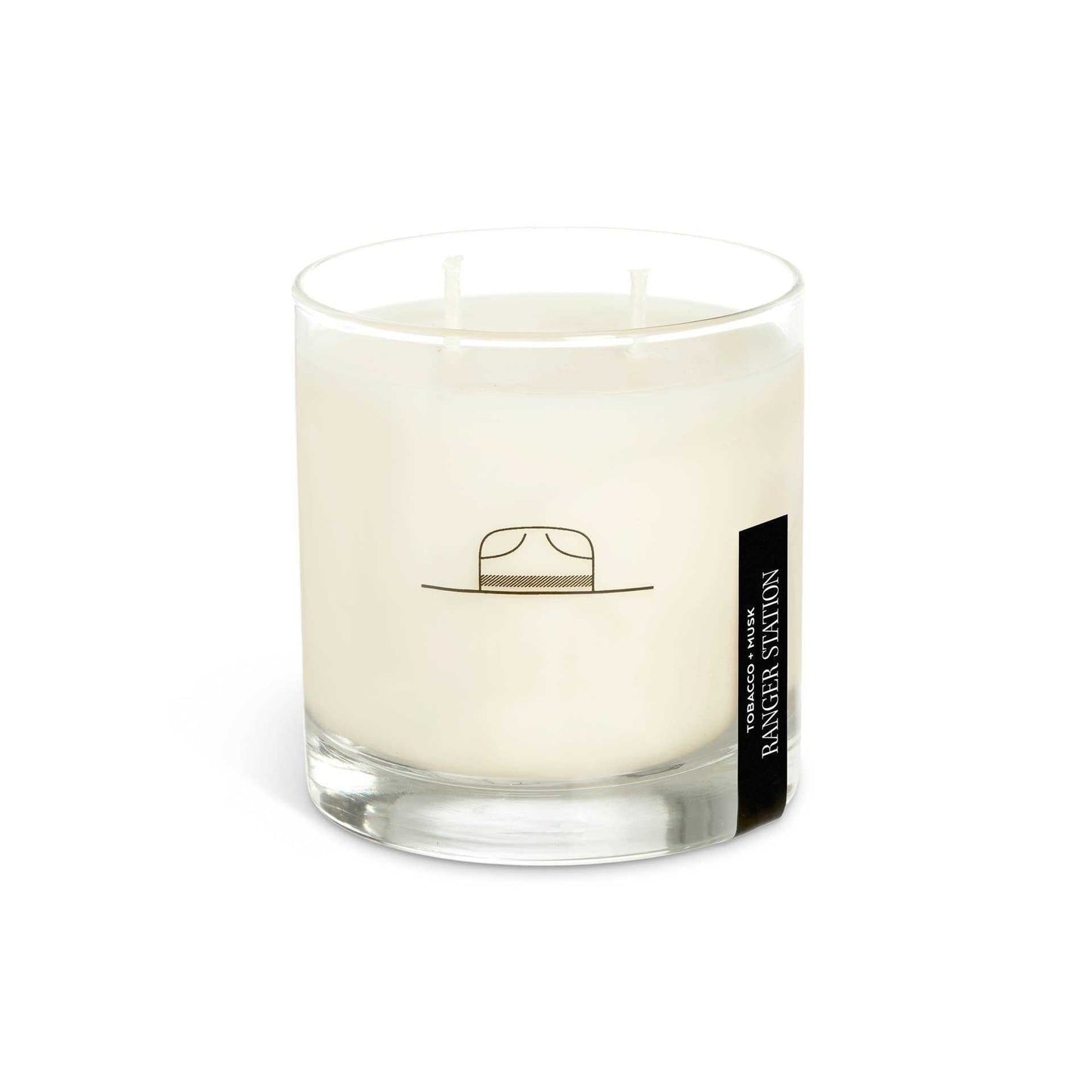 Tobacco + Musk Candle in 11 oz rocks glass with warm, woody fragrance and dual wick design