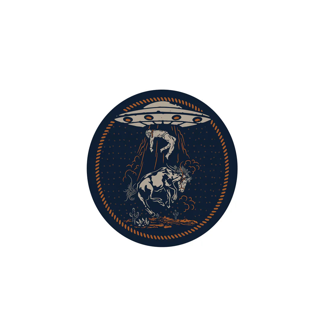 Vinyl sticker featuring cowboy and horse being abducted by UFO, Sendero Charros theme.