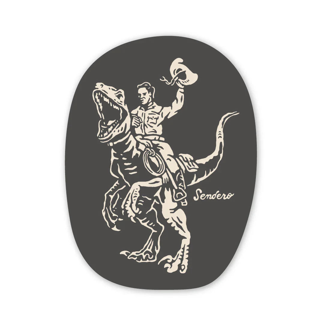Sendero Velociwrangler Sticker featuring cowboy riding a velociraptor.