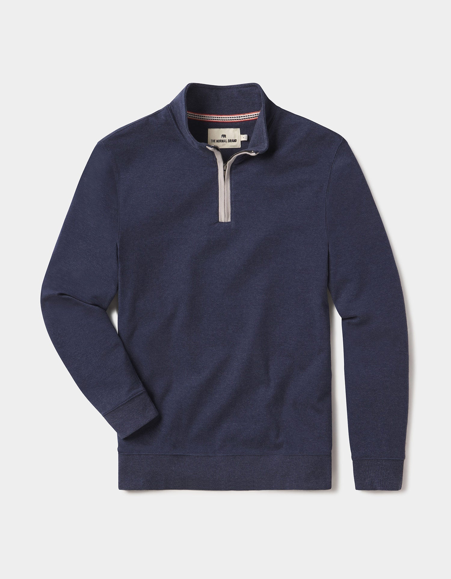 The Normal Brand Puremeso Weekend Quarter Zip pullover in navy with metal zipper and embroidered bear logo