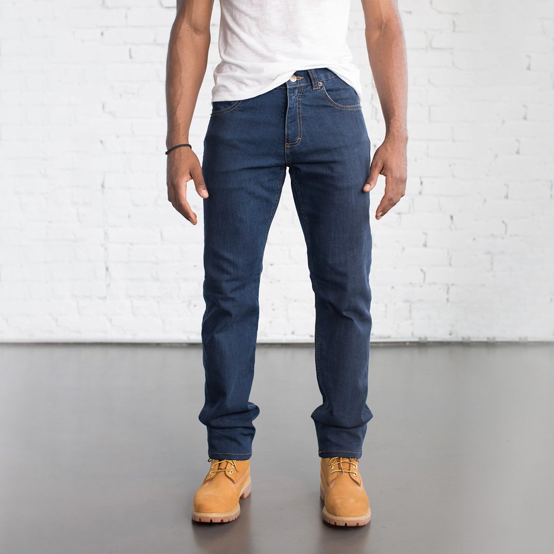 Dearborn Tailored Fit Denim in Medium Wash with a sleek fit through thighs, medium rise, and tapered below the knee.