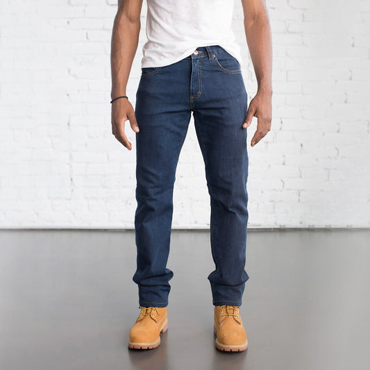 Dearborn Tailored Fit Denim in Medium Wash with a sleek fit through thighs, medium rise, and tapered below the knee.