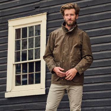 the long haul jacket in tobacco waxed canvas Dark Oak reimagined in waxed canvas with a functional zip Tom Beckbe Tensaw Jacket Tobacco